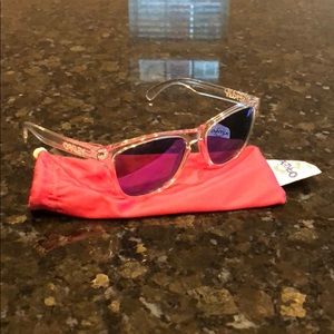 Clear Oakley Frogskins with purple lenses